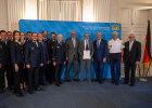 Gruppenbid Herrmann mit Firmenvertretern und Einsatzkräften